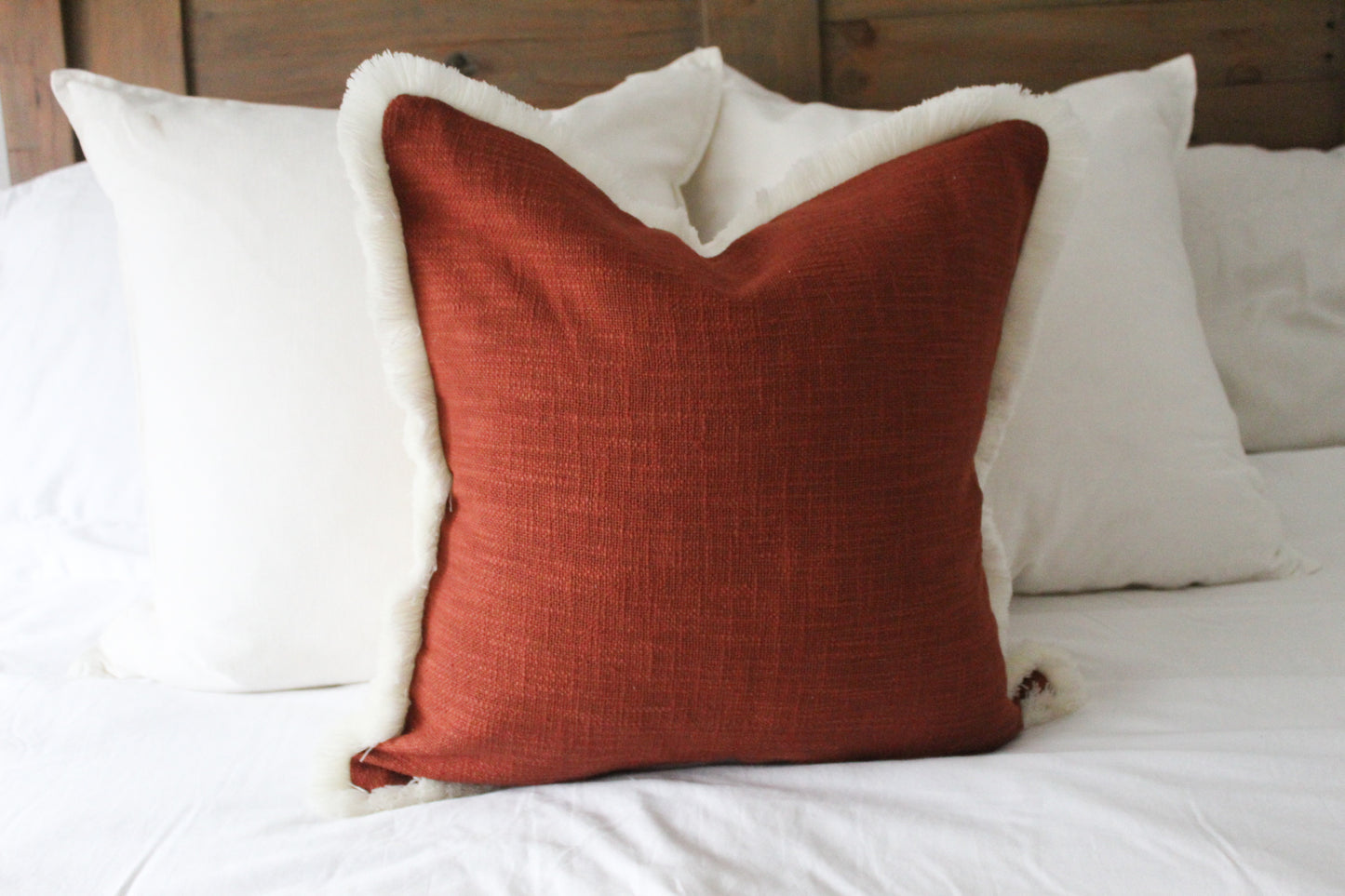 Terracotta fringed cream trim cotton cushion 45 x 45cm
