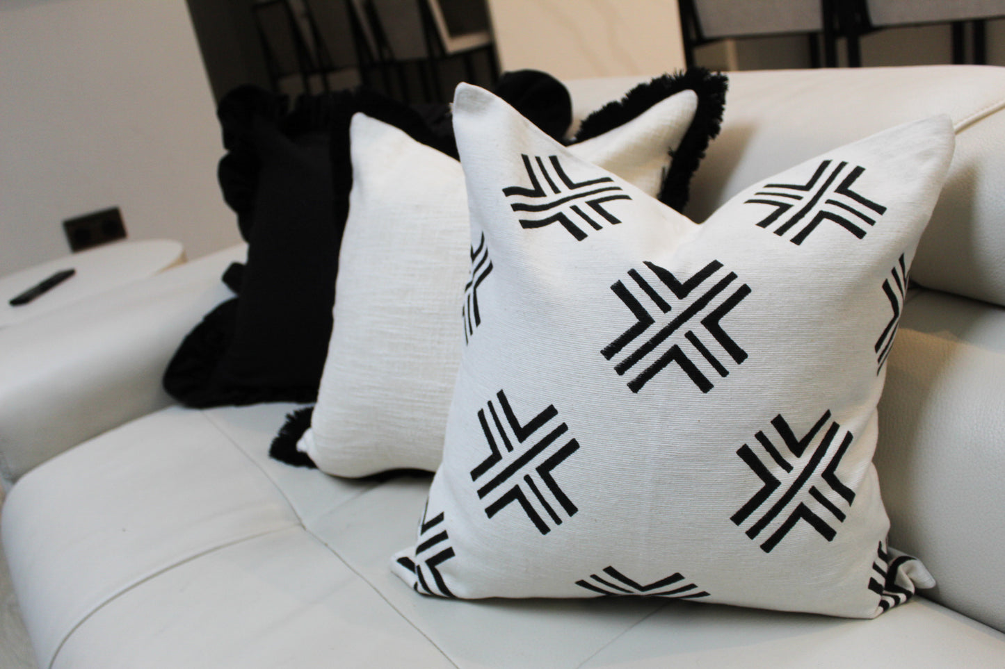 Ivory cross print cotton cushion 45x45cm