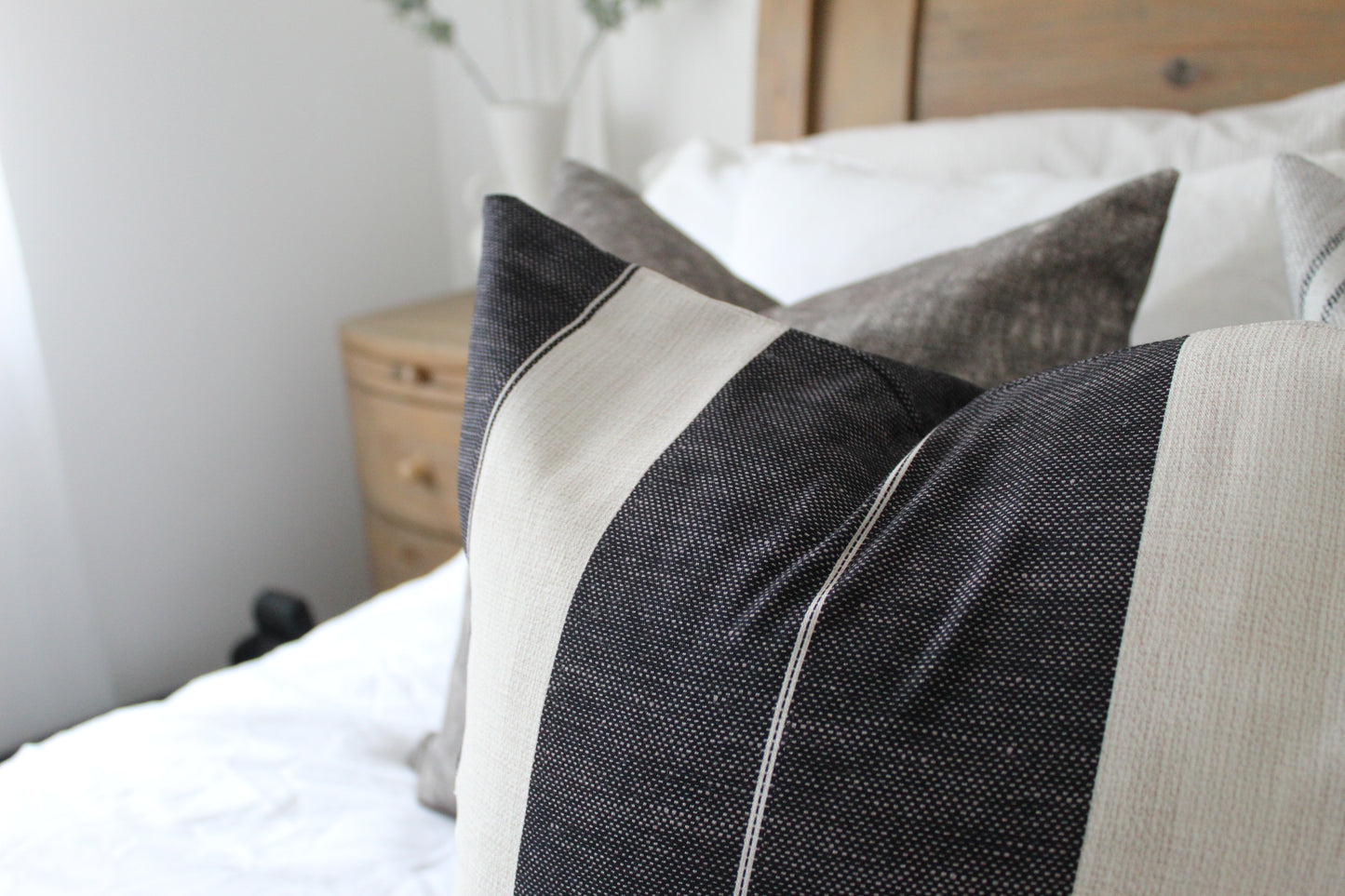Navy tickling cotton cushion with feather inserts