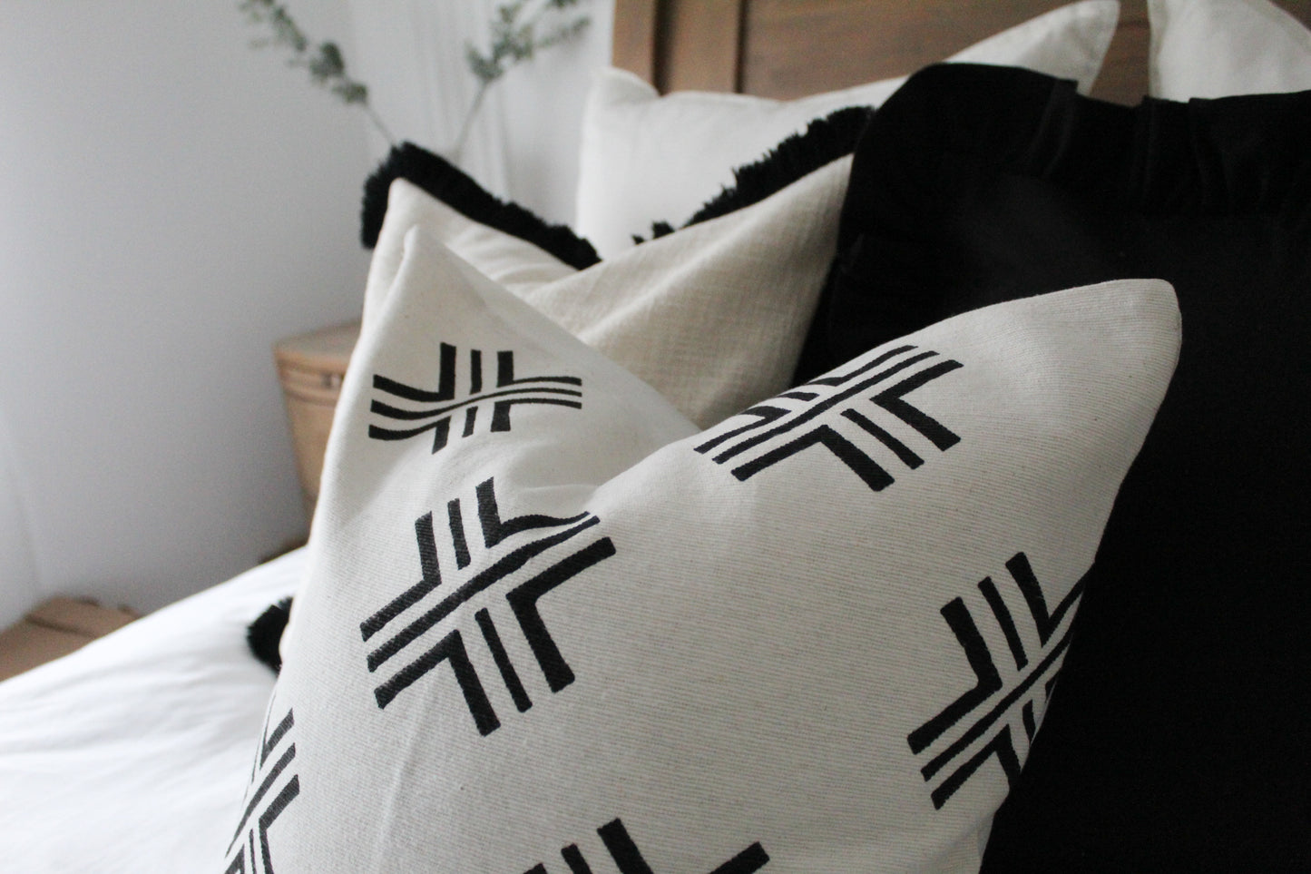 Ivory cross print cotton cushion 45x45cm