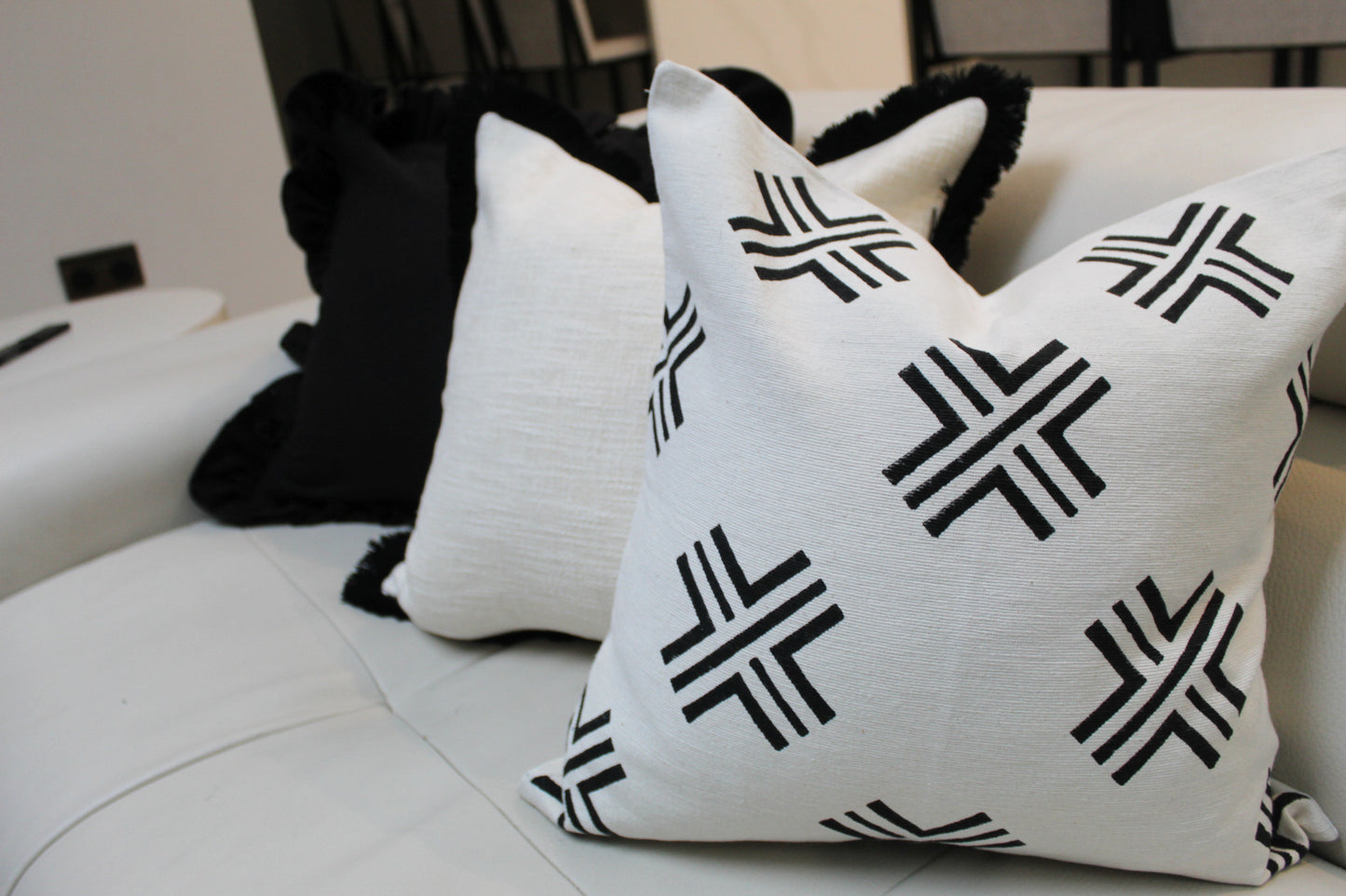 Ivory cross print cotton cushion 45x45cm