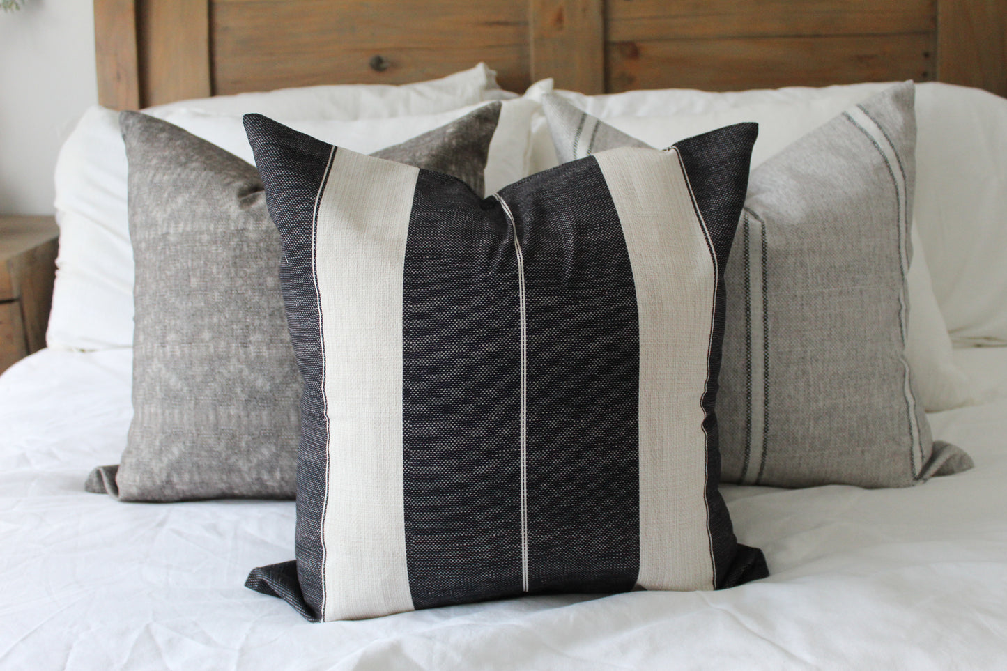 Navy tickling cotton cushion with feather inserts