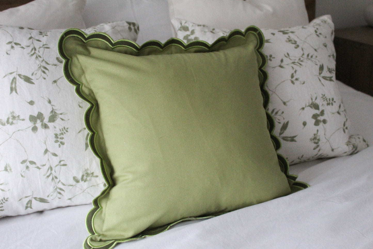 Green scalloped edge cotton cushion 45x45cm