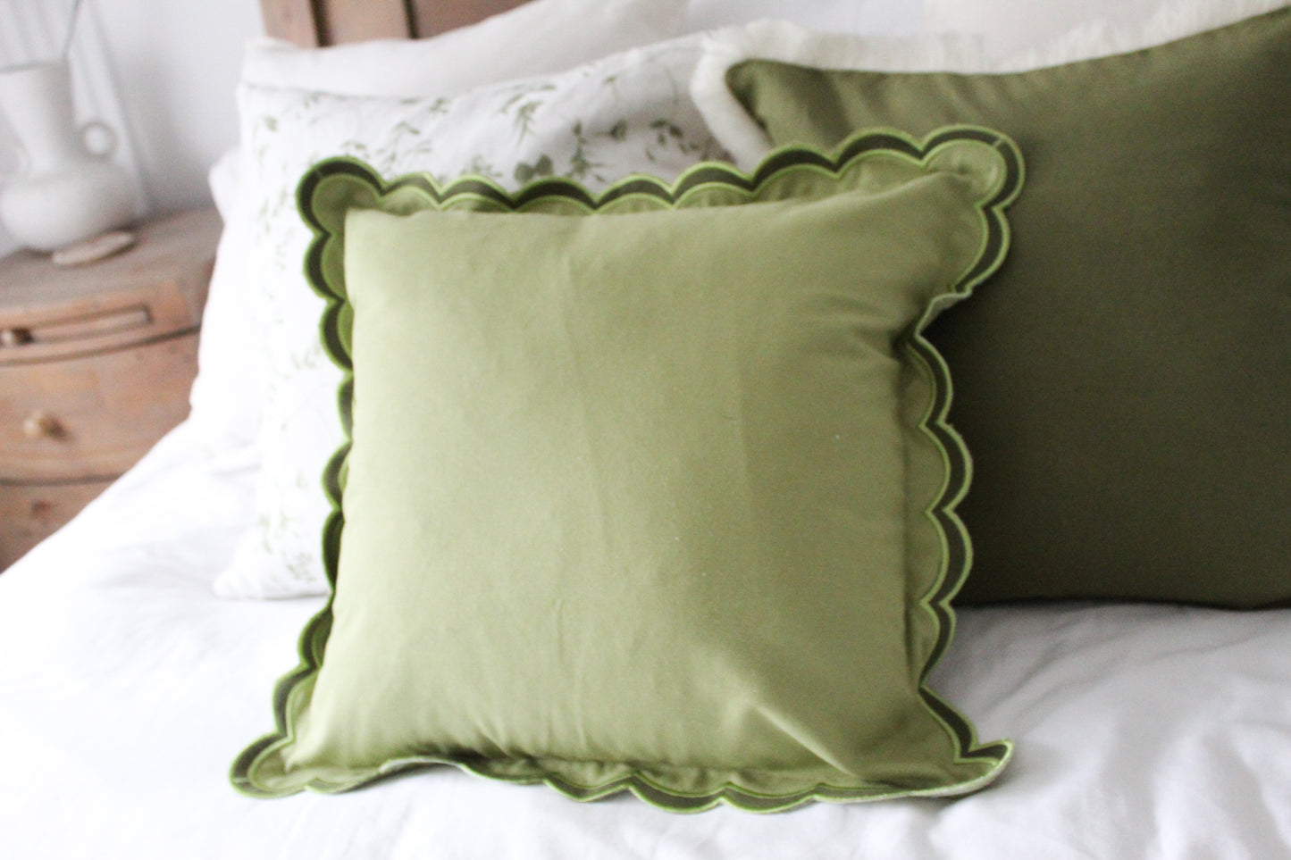 Green scalloped edge cotton cushion 45x45cm