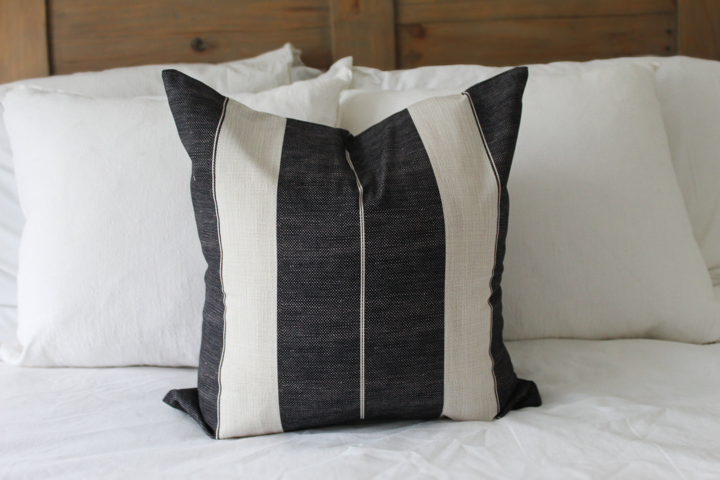 Navy tickling cotton cushion with feather inserts