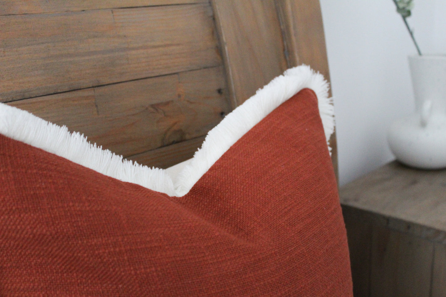 Terracotta fringed cream trim cotton cushion 45 x 45cm