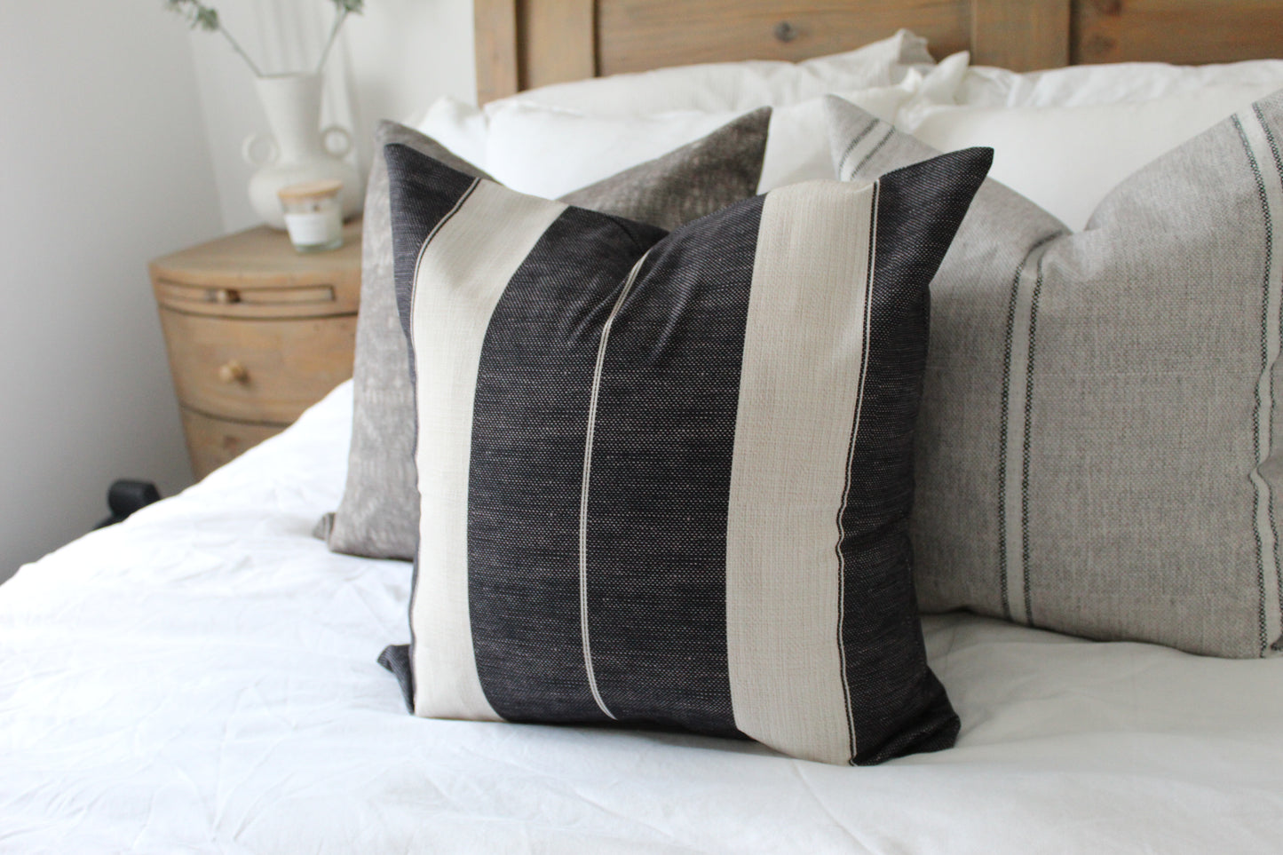 Navy tickling cotton cushion with feather inserts
