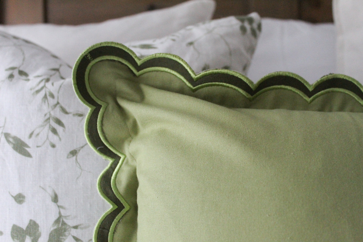 Green scalloped edge cotton cushion 45x45cm