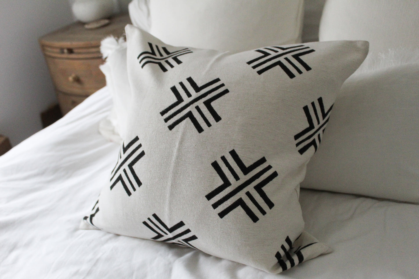 Ivory cross print cotton cushion 45x45cm