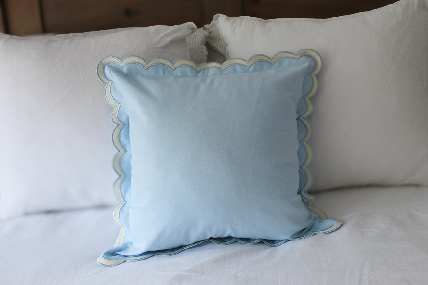 Blue scalloped edge cushion with duck feather insert 45x45cm