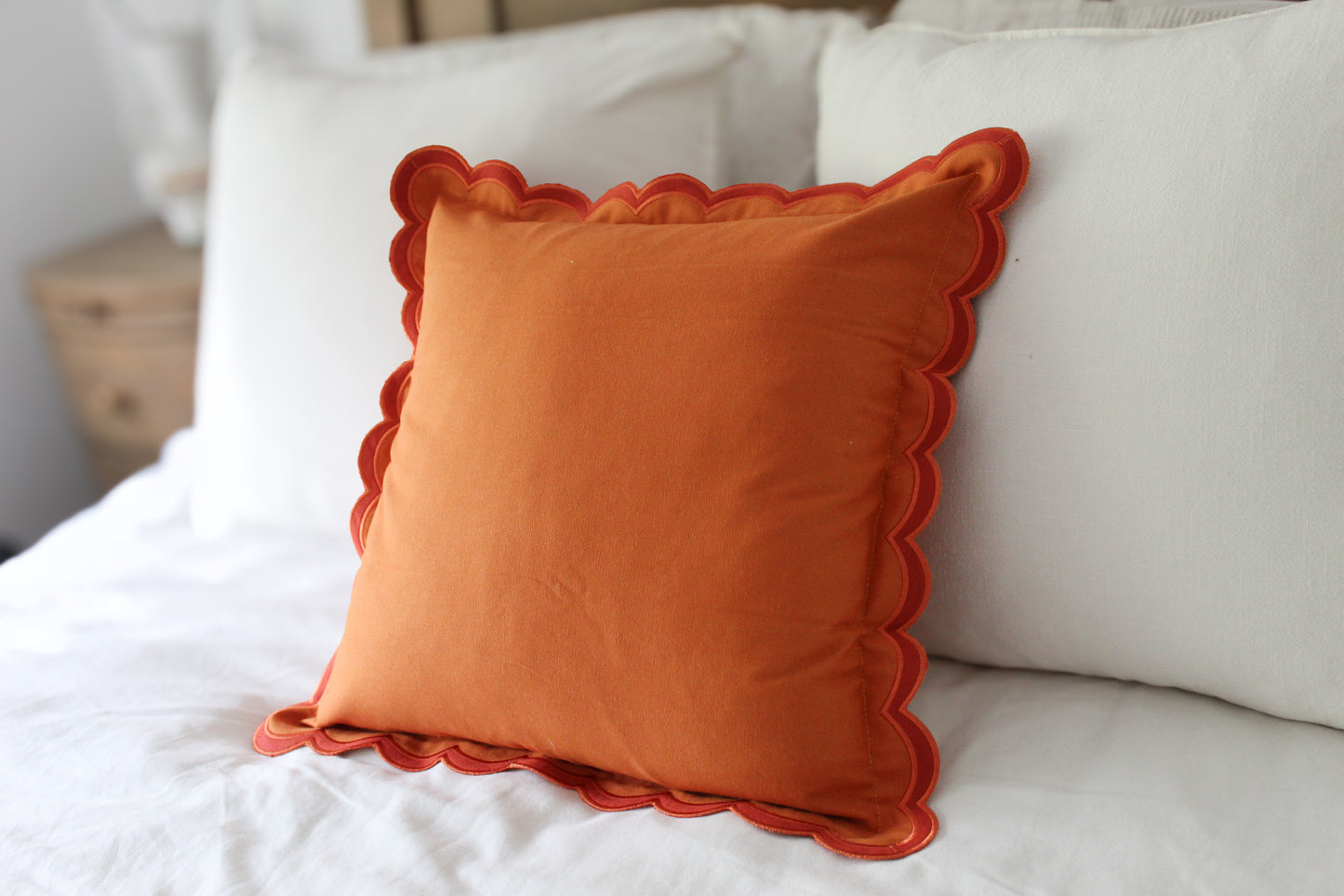Orange scalloped edge cotton cushion with duck feather inserts 45 x 45cm