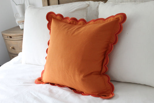 Orange scalloped edge cotton cushion with duck feather inserts 45 x 45cm