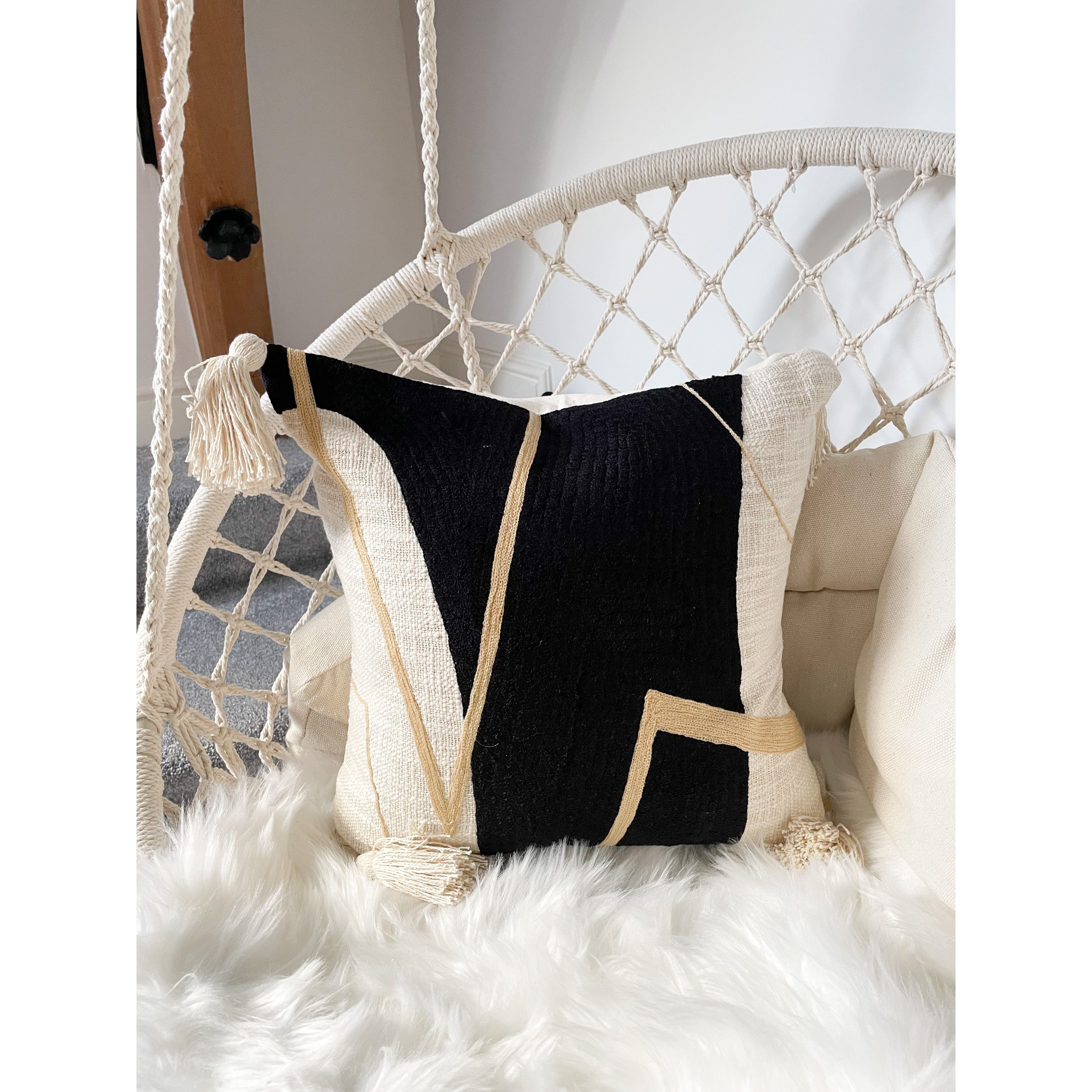 Black tassel clearance cushion